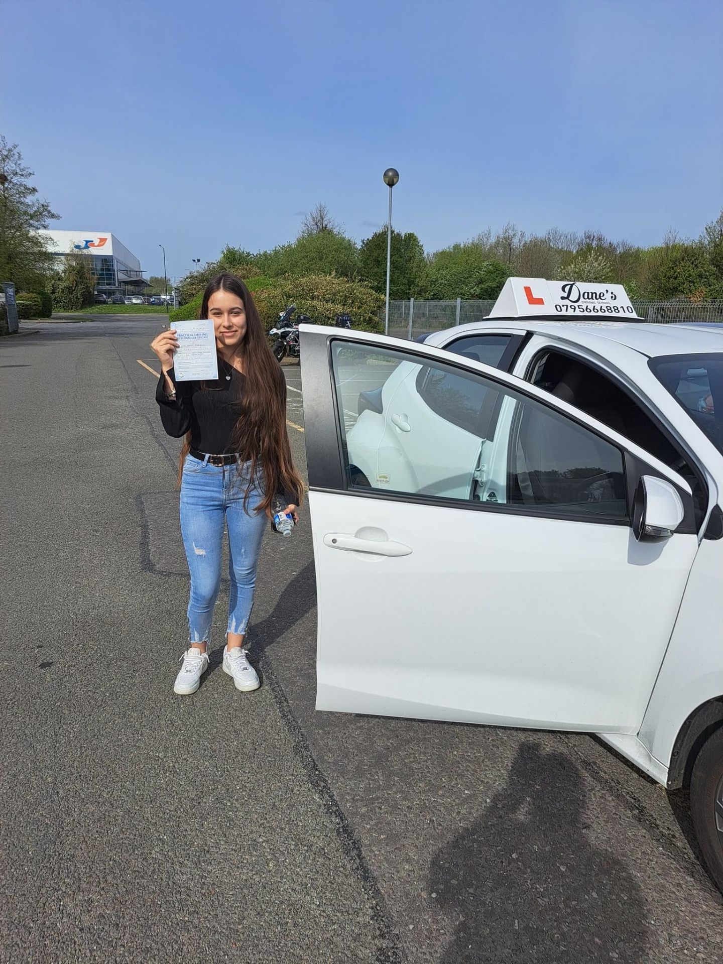 Happy learner passing her driving test with Dane
