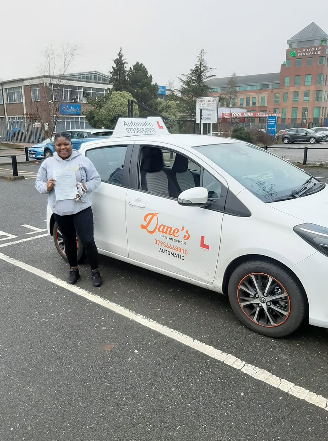 Student celebrating his pass certificate
